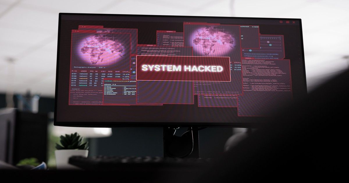 system-hacked-message-on-computer-screen-close-up