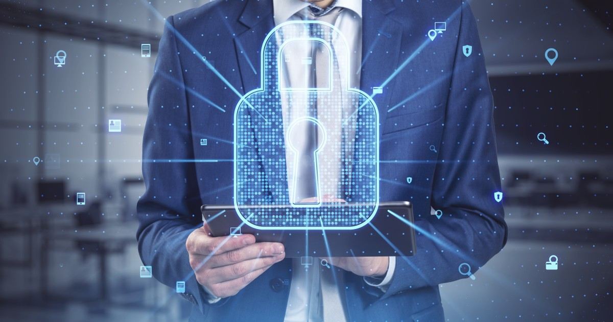 digital-security-man-holding-tablet-with-glowing